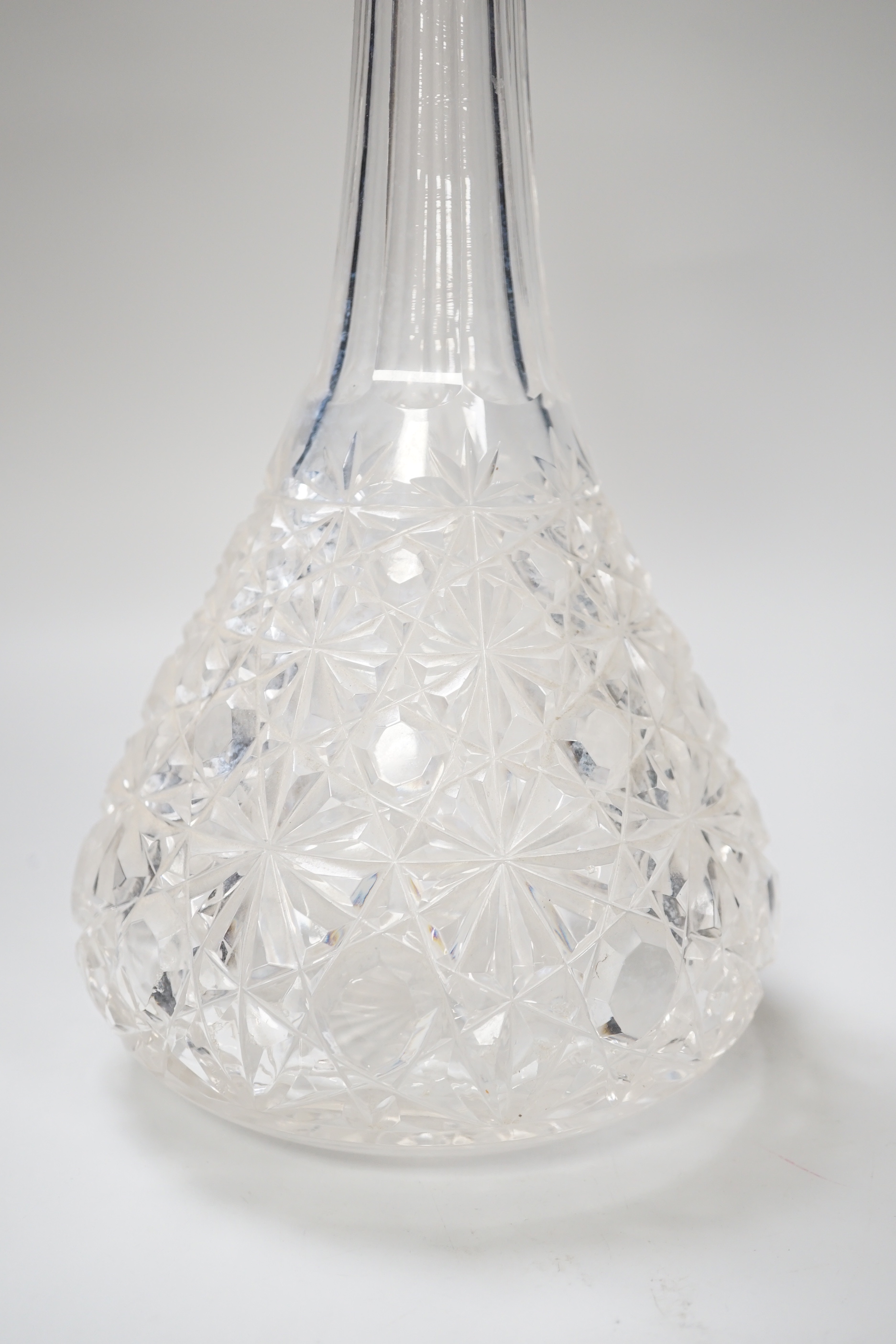 A George V silver collared cut glass decanter and stopper, London 1926, 37cm tall